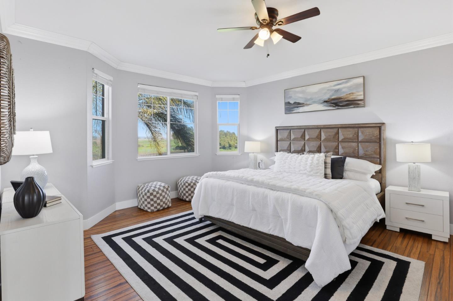 609 Rockspray Circle Pittsburg, CA 94565 - Photo 27 of 43 a bedroom with a bed and a chandelier