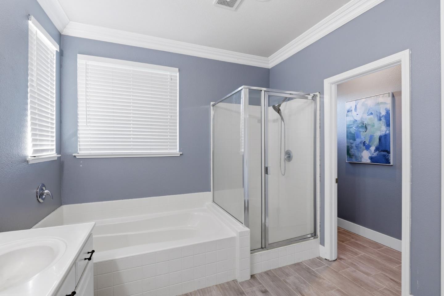 609 Rockspray Circle Pittsburg, CA 94565 - Photo 30 of 43 a bathroom with a bathtub and a shower