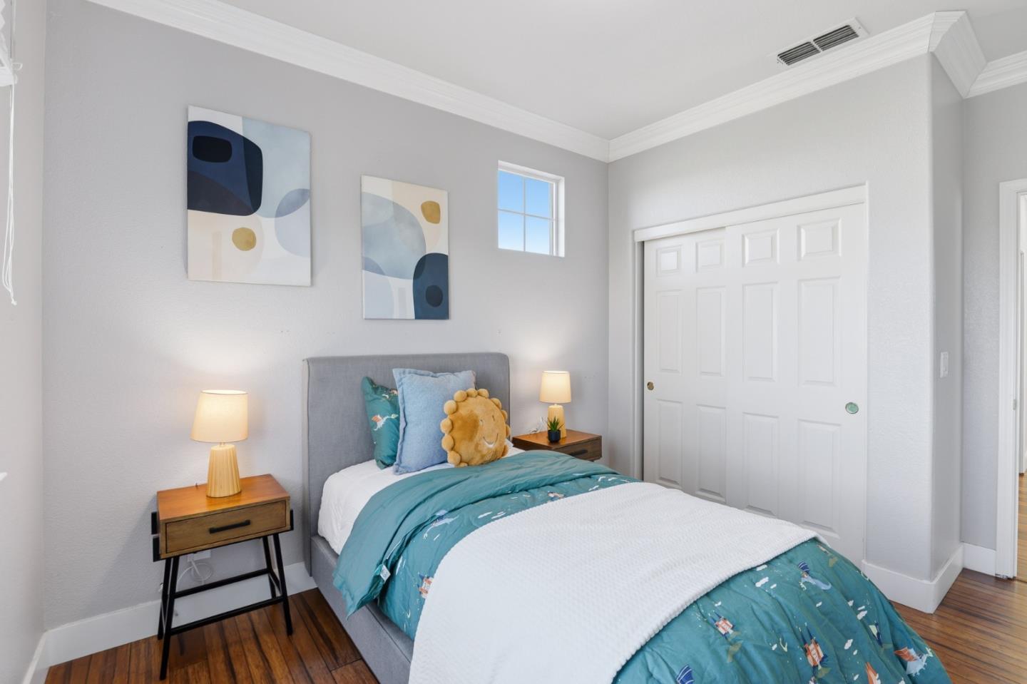 609 Rockspray Circle Pittsburg, CA 94565 - Photo 36 of 43 a bedroom with a bed a mirror and lamp