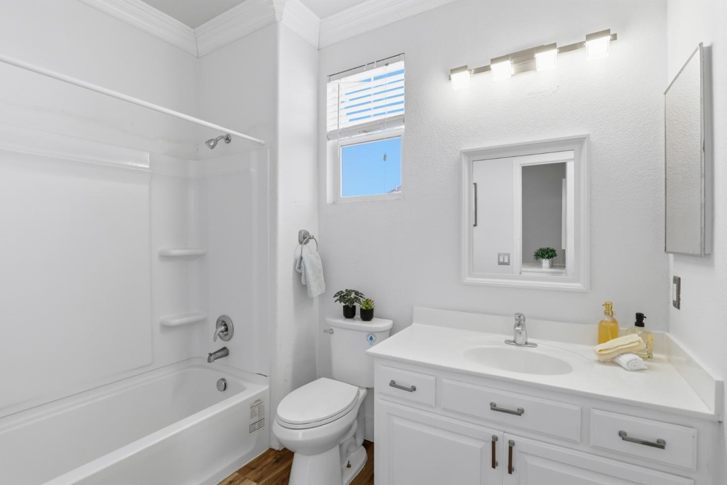 609 Rockspray Circle Pittsburg, CA 94565 - Photo 37 of 43 a bathroom with a sink a toilet and shower