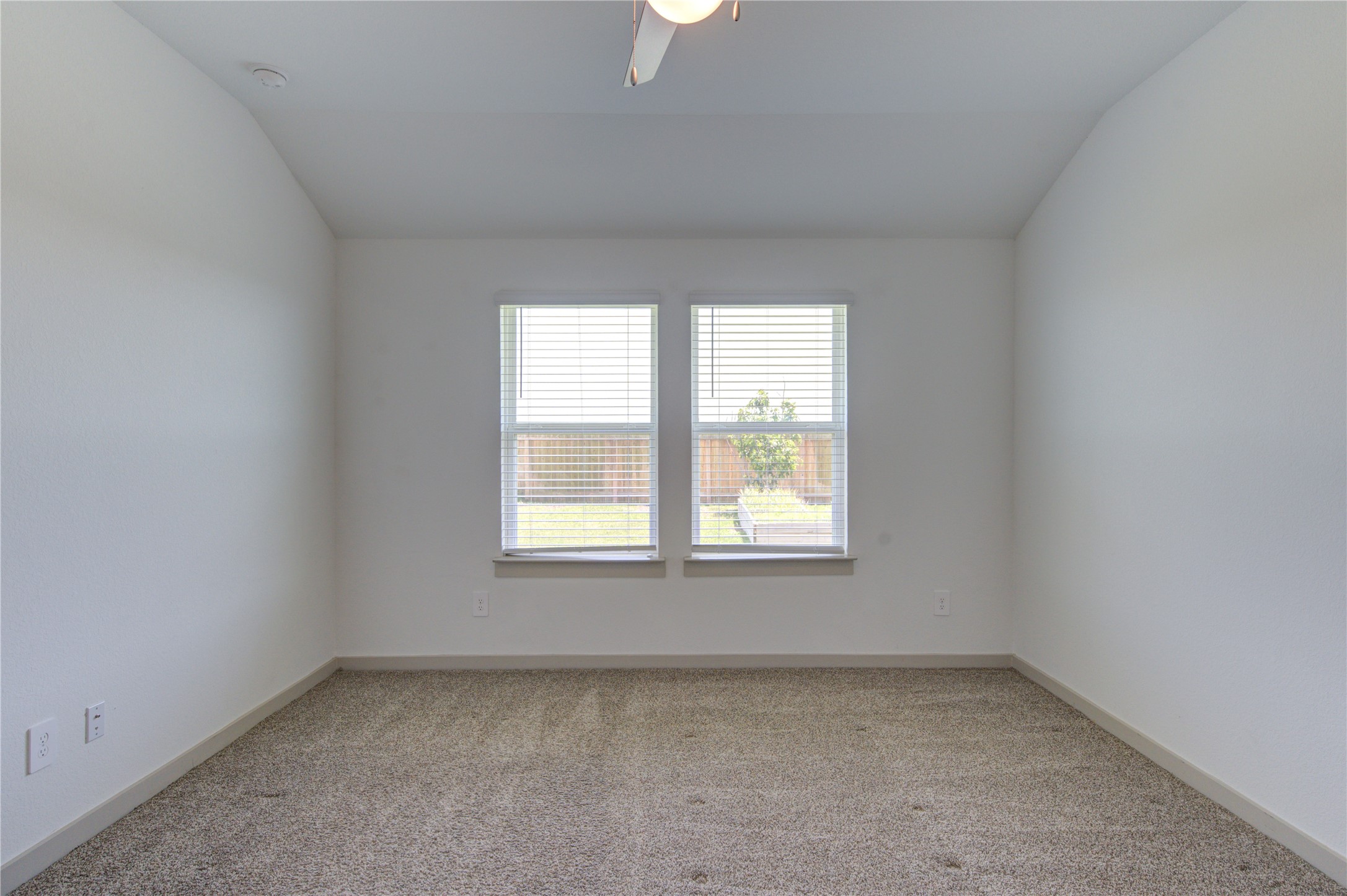 41 Desert Spring Lane Manvel, TX 77578 - Photo 18 of 33 an empty room with a window