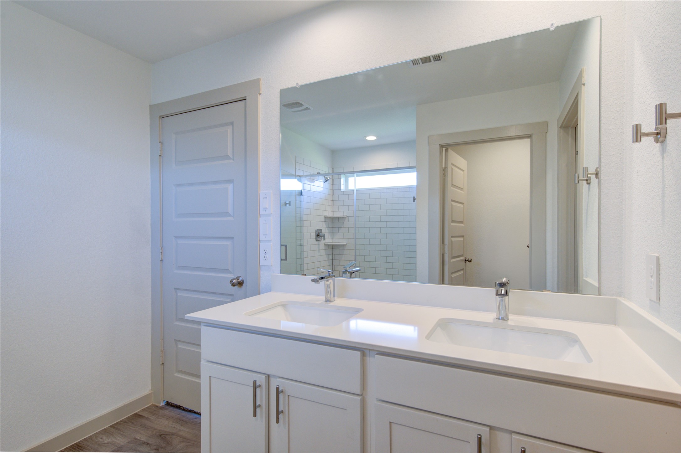 41 Desert Spring Lane Manvel, TX 77578 - Photo 20 of 33 a bathroom with a sink and a mirror