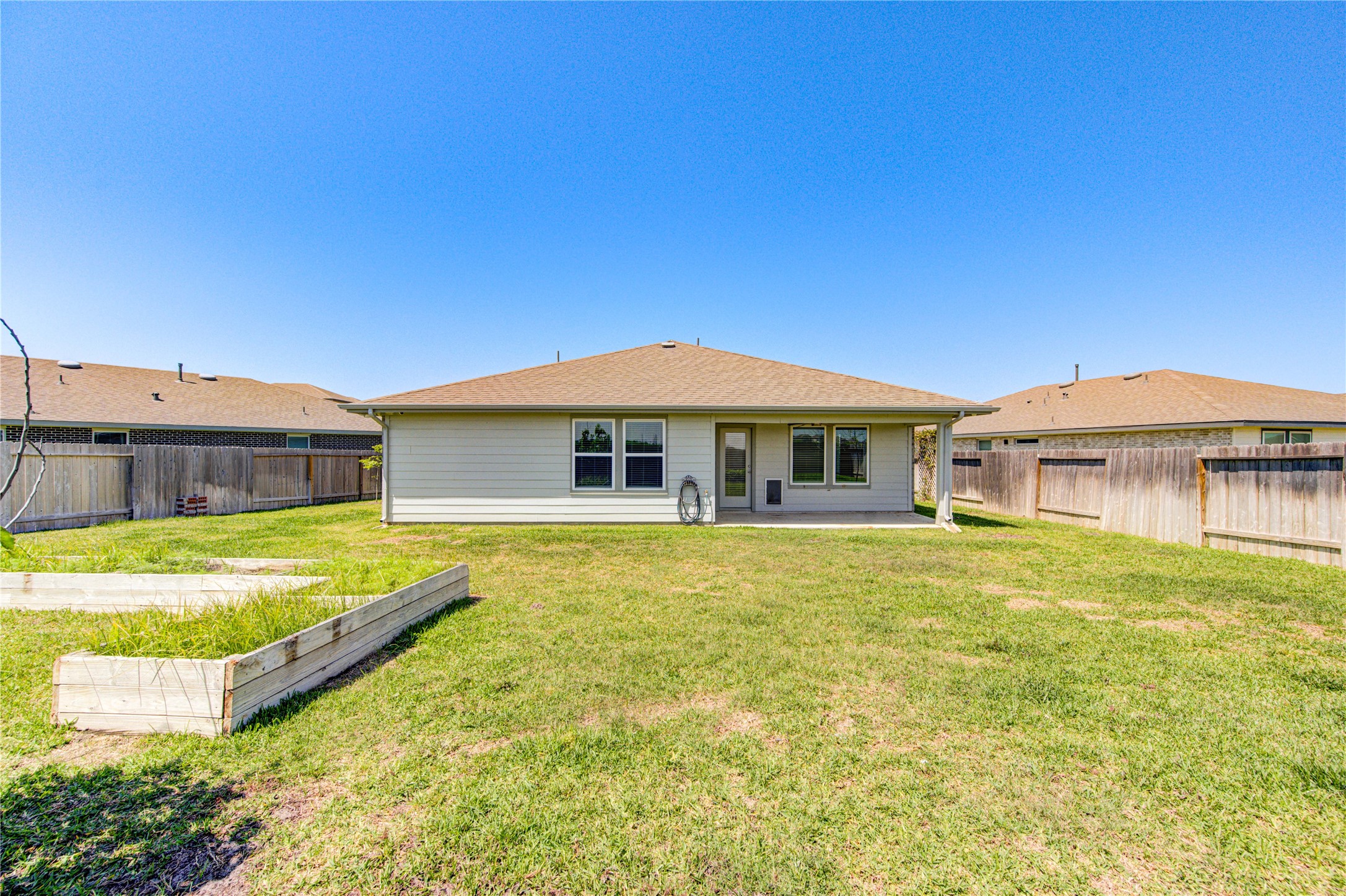 41 Desert Spring Lane Manvel, TX 77578 - Photo 33 of 33 a front view of a house with swimming pool