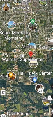 a view of wooden fence and trees