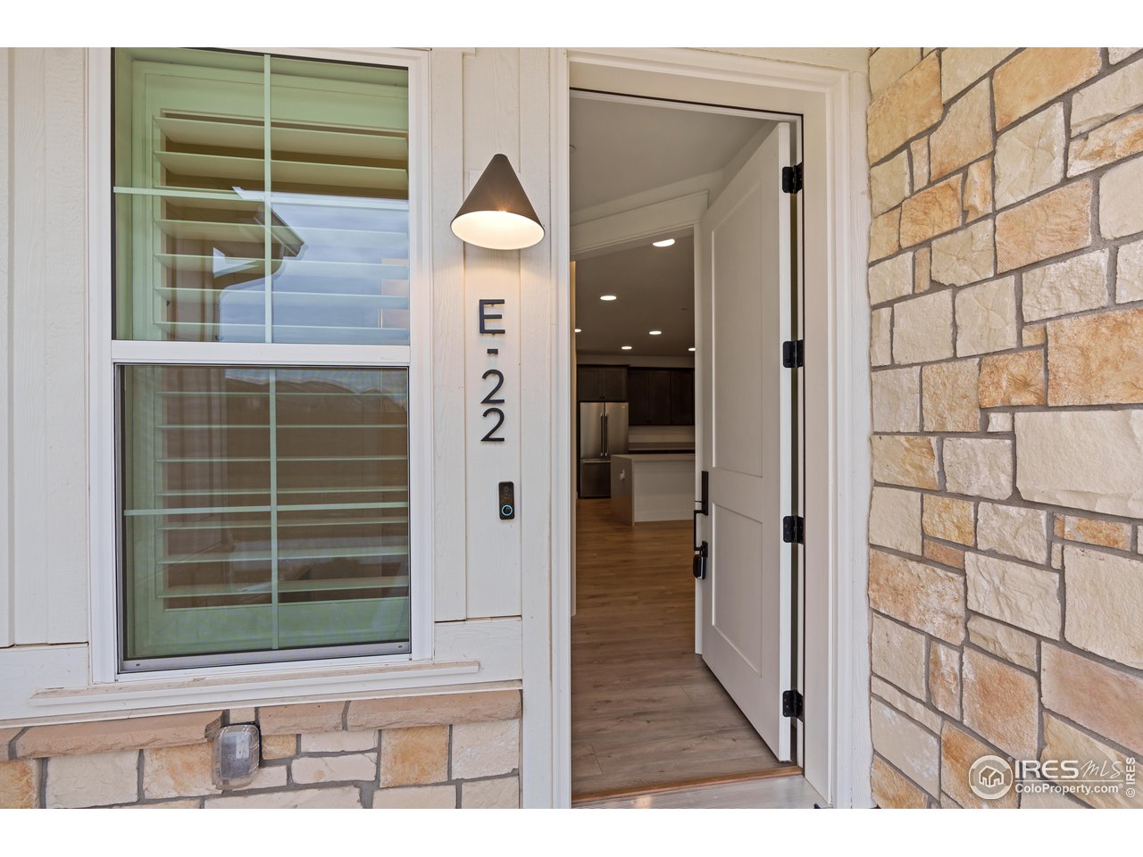 3045 East Trilby Road, Unit 22 Fort Collins, CO 80528 - Photo 4 of 38 Inviting 8ft door entrance.