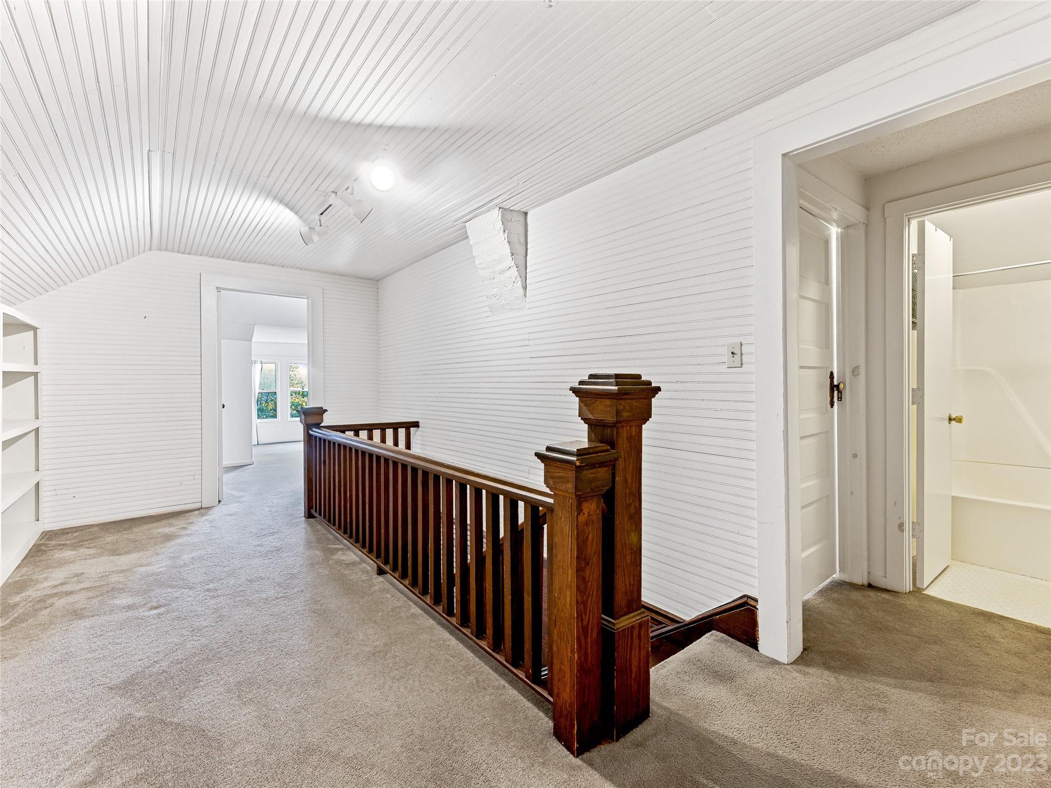 1200 Redmon Road Marshall, NC 28753 - Photo 23 of 37 a view of a hallway with closet and stairs