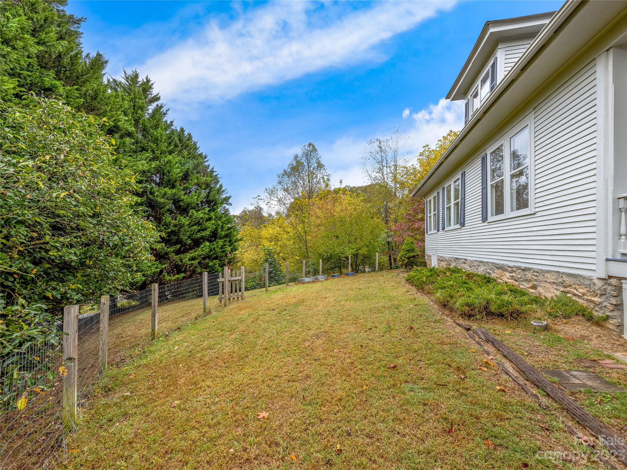 1200 Redmon Road Marshall, NC 28753 - Photo 33 of 37 a view of backyard of house with green space
