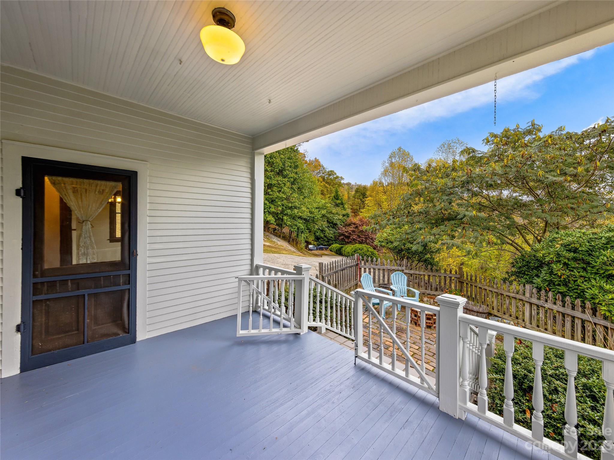 1200 Redmon Road Marshall, NC 28753 - Photo 5 of 37 a view of a balcony with chairs
