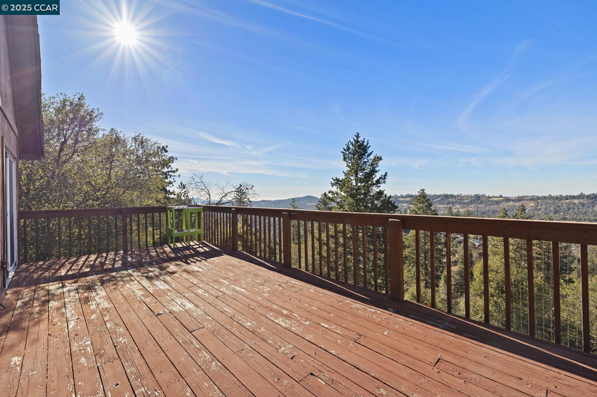 18957 Stag Circle Tuolumne, CA 95379 - Photo 18 of 22 a view of balcony with wooden floor