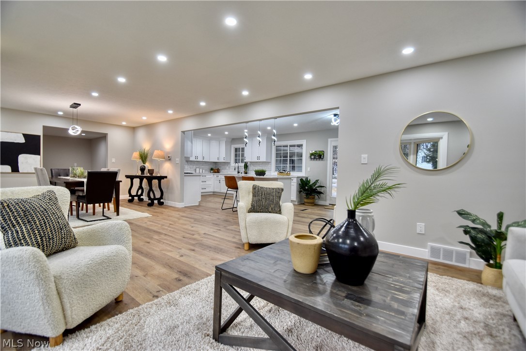 7520 Johnnycake Ridge Road Mentor, OH 44060 - Photo 19 of 36 Living room featuring light wood-type flooring