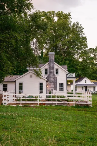 a aerial view of a house with a yard