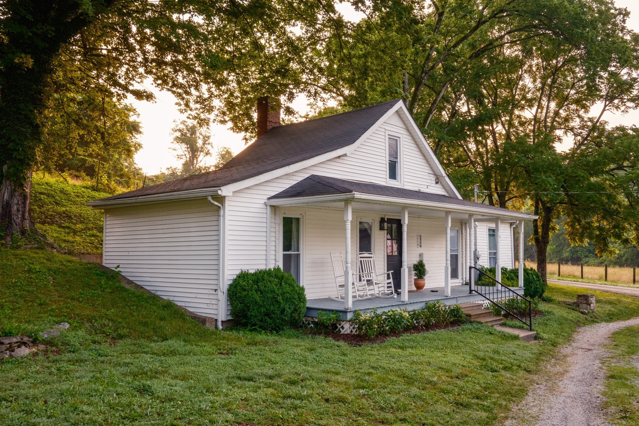 2405 Thompson Road Lewisburg, TN 37091 - Photo 39 of 71 a view of a yard in front of a house with plants and large tree