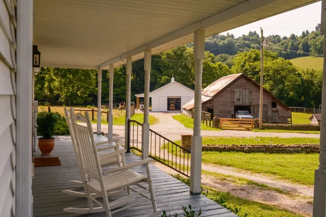 a backyard of a house with lots of green space