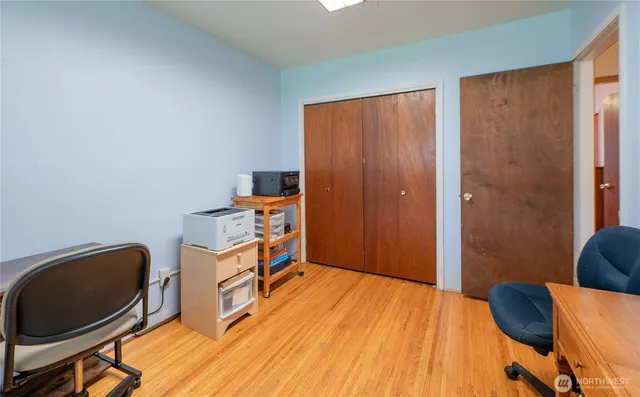 a room with furniture and wooden floor