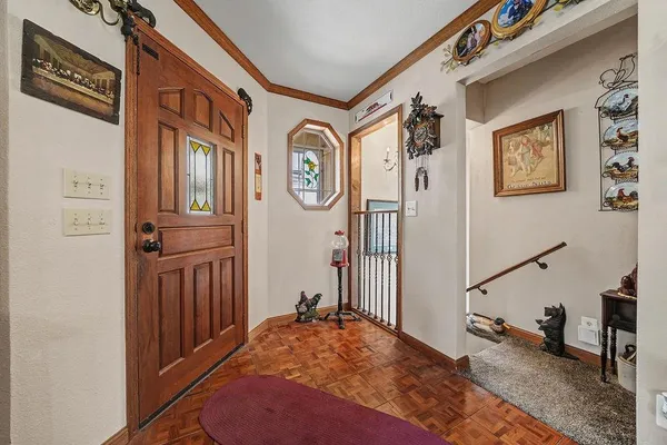 a view of a hallway with entryway