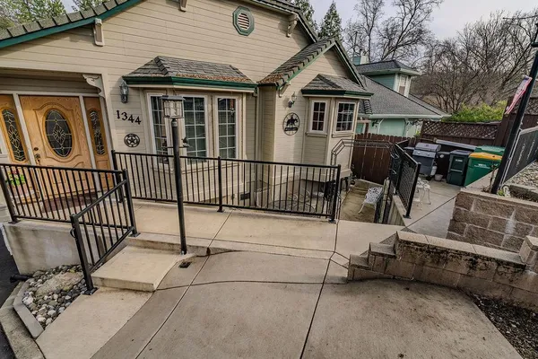 a view of an chairs and tables in the patio