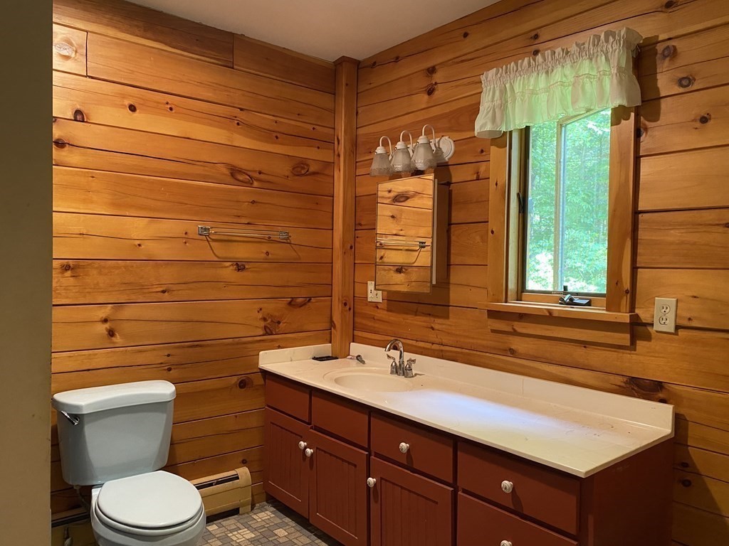 72 North Hillside Road Deerfield, MA 01373 - Photo 12 of 29 a bathroom with a sink a toilet and shower