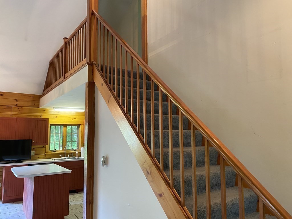 72 North Hillside Road Deerfield, MA 01373 - Photo 14 of 29 a view of staircase with wooden floor and fan