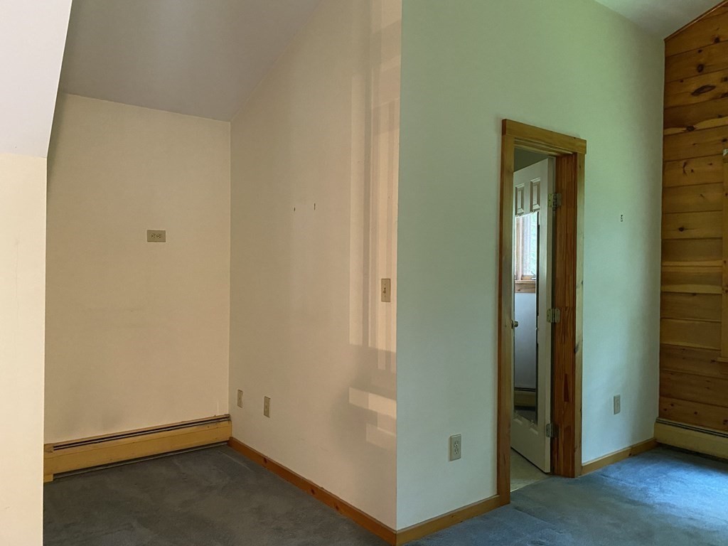 72 North Hillside Road Deerfield, MA 01373 - Photo 15 of 29 an empty room with wooden floor and closet
