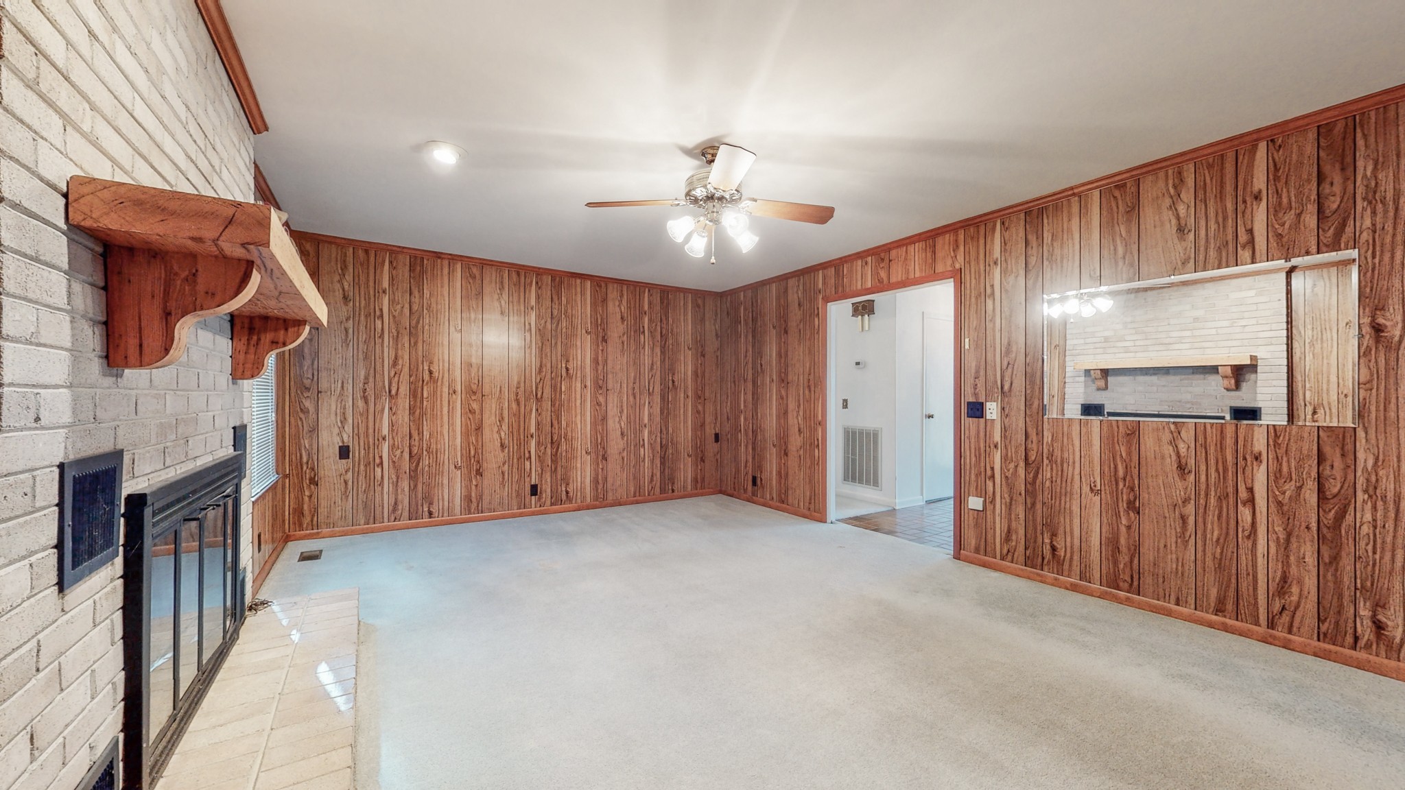 2124 Hillsboro Road Franklin, TN 37069 - Photo 14 of 44 a view of an empty room with a fireplace