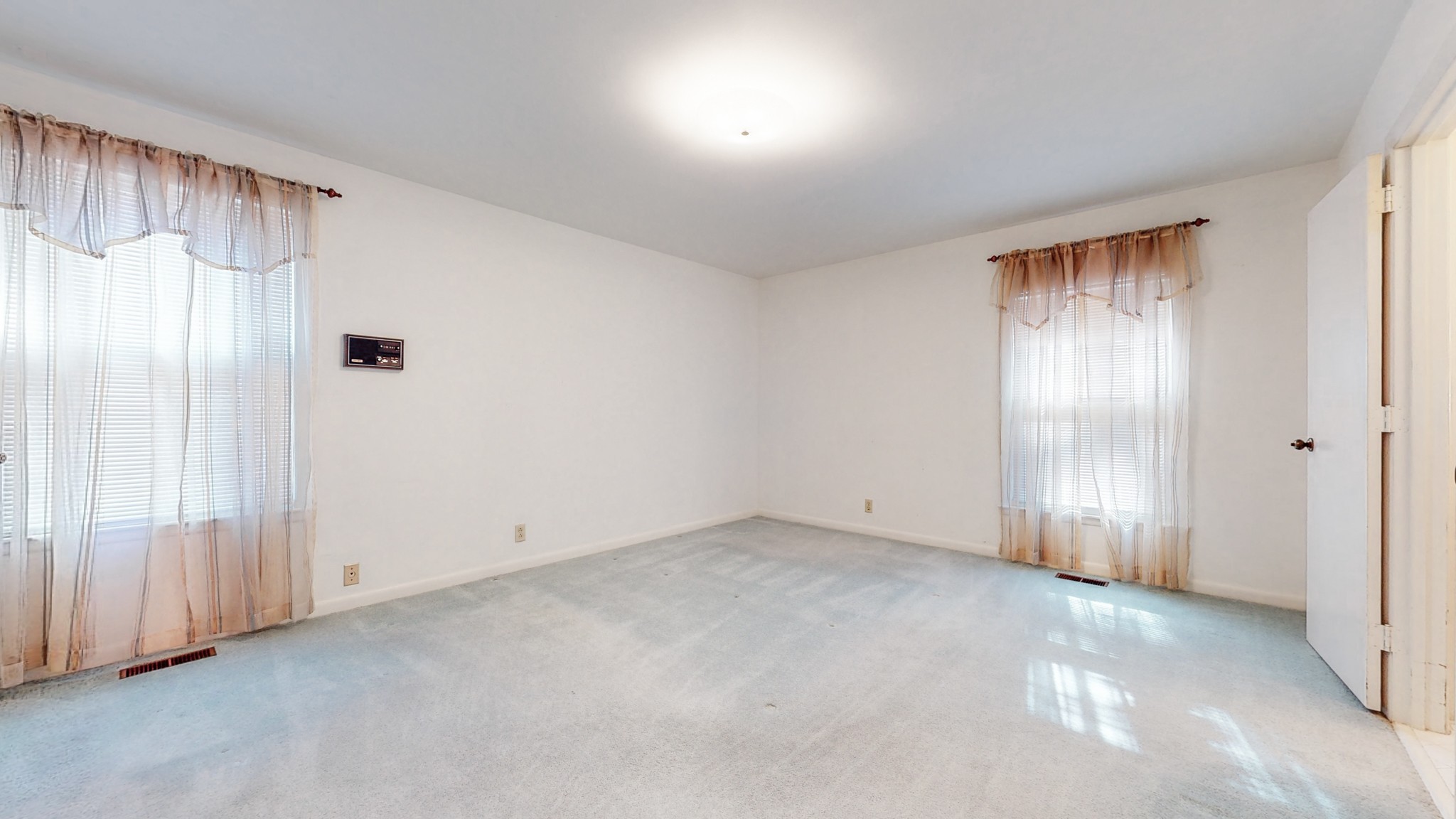 2124 Hillsboro Road Franklin, TN 37069 - Photo 16 of 44 a view of an empty room with a window