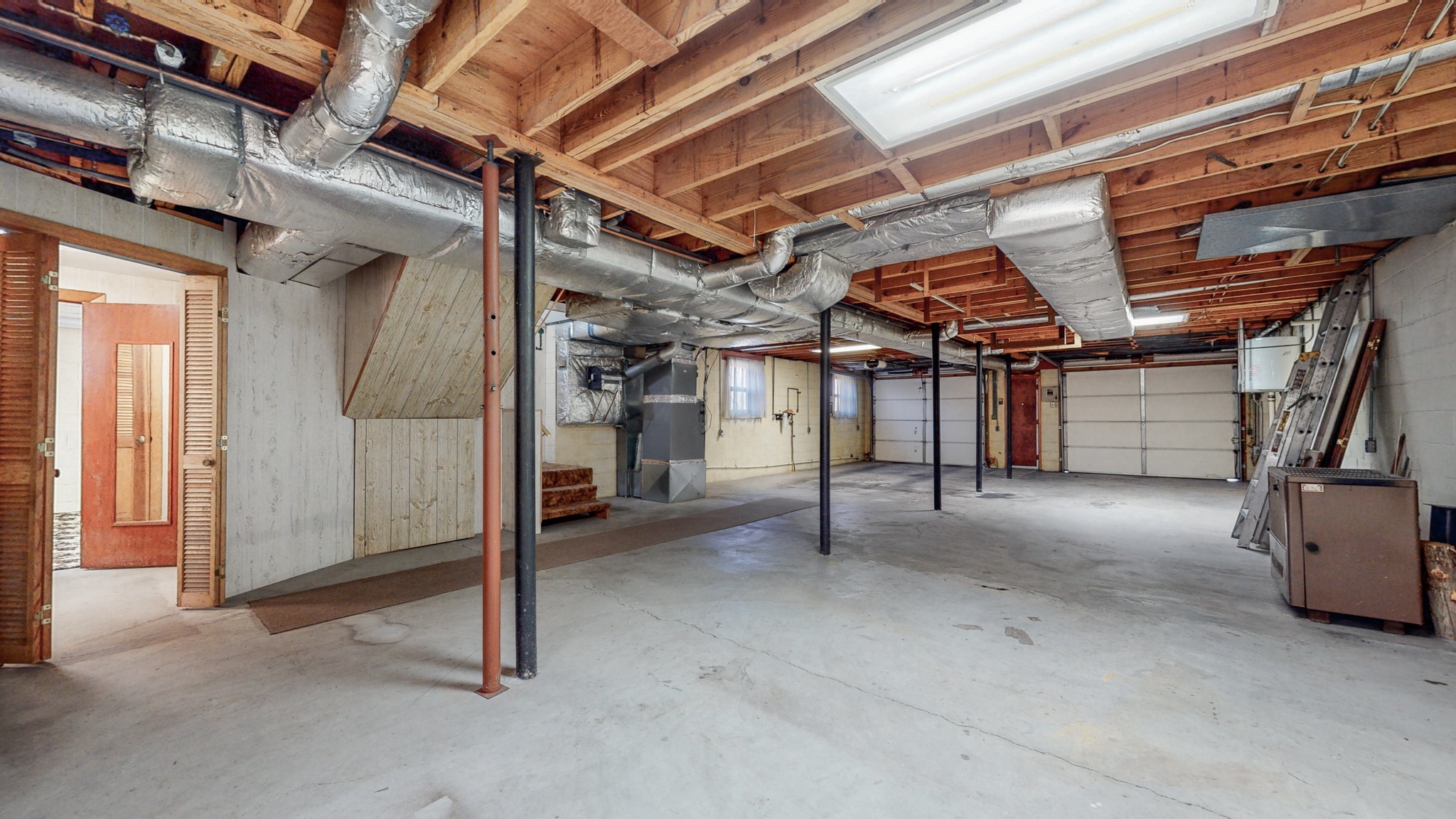 2124 Hillsboro Road Franklin, TN 37069 - Photo 25 of 44 a view of an empty room with wooden roof