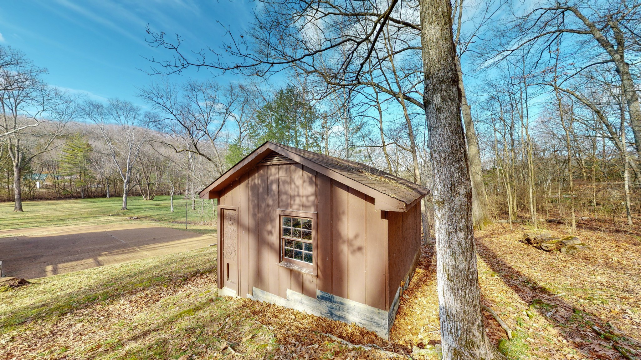 2124 Hillsboro Road Franklin, TN 37069 - Photo 38 of 44 a view of a house with a yard