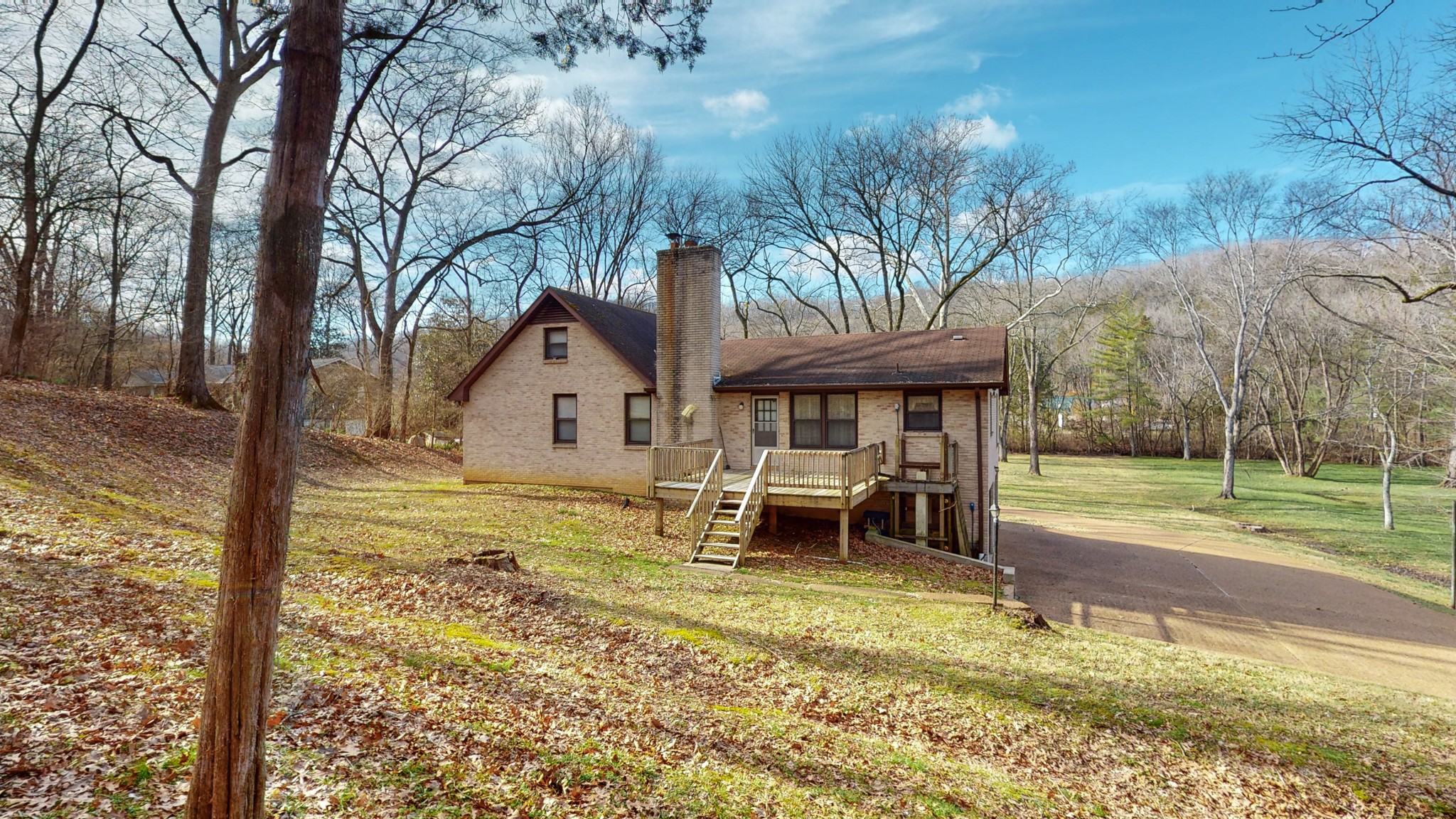 2124 Hillsboro Road Franklin, TN 37069 - Photo 39 of 44 a view of a house with garden and sitting area