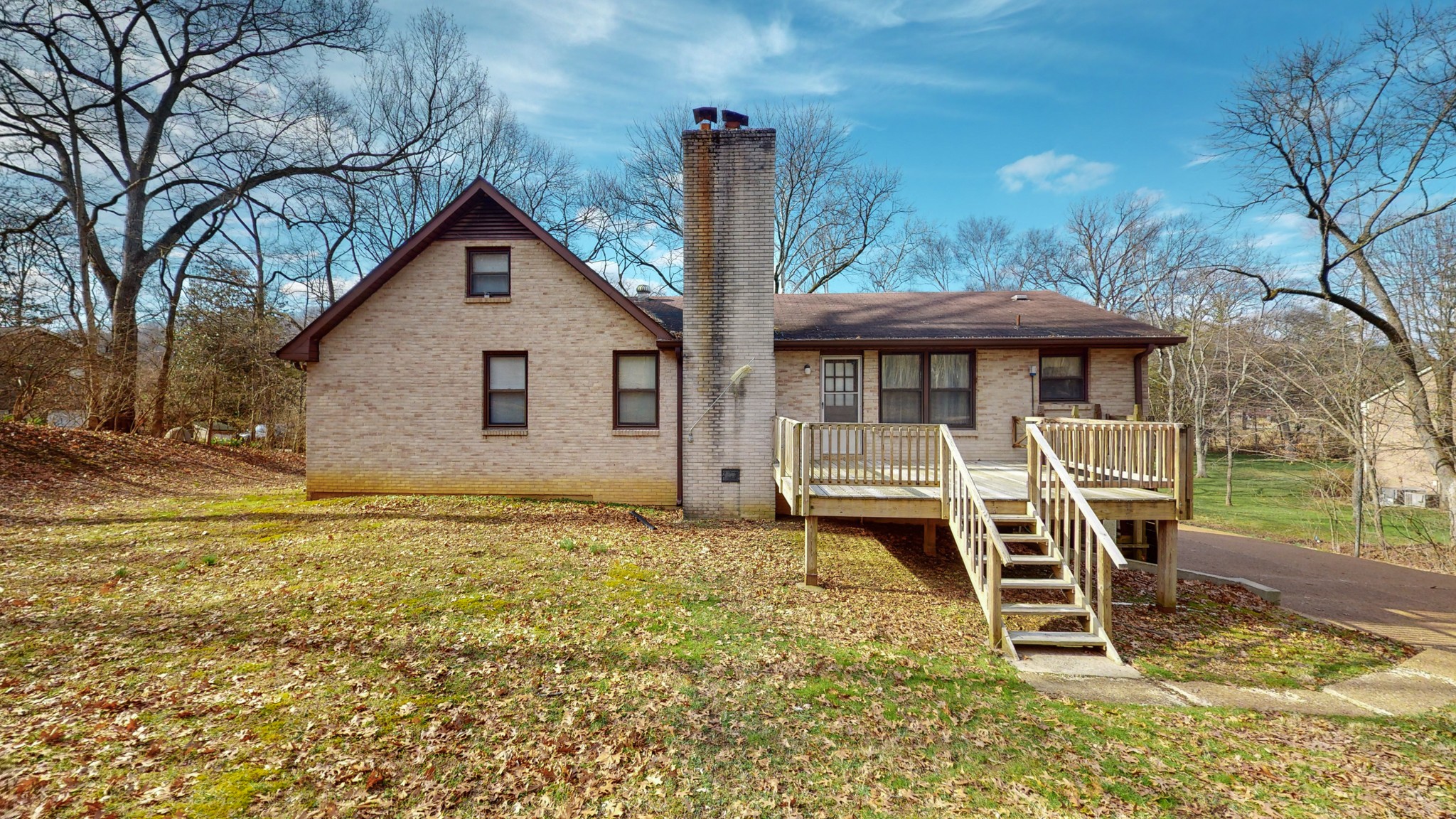 2124 Hillsboro Road Franklin, TN 37069 - Photo 40 of 44 a front view of a house with garden