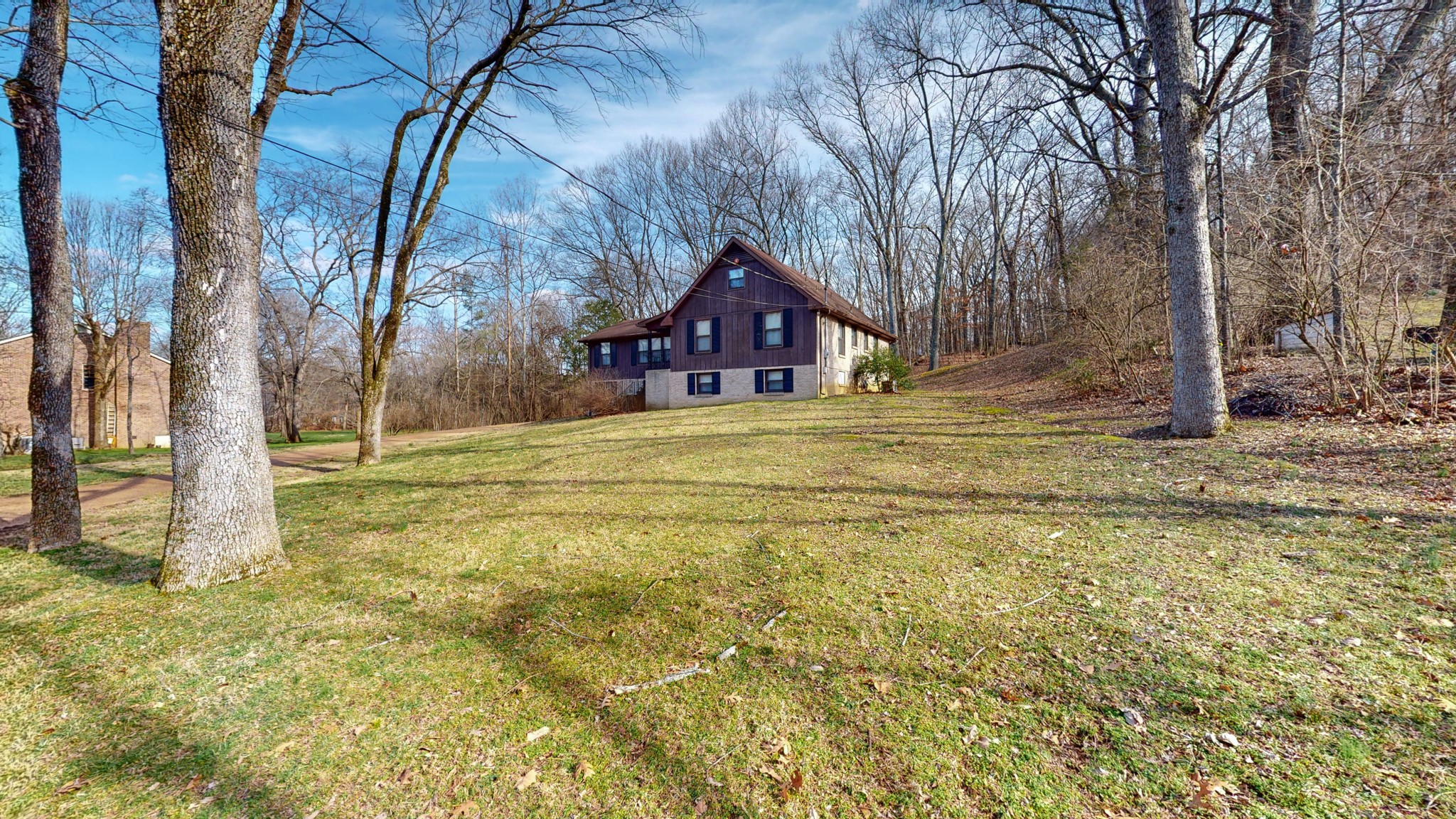 2124 Hillsboro Road Franklin, TN 37069 - Photo 44 of 44 a front view of a house with a yard