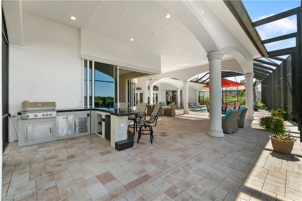 208 Audubon Boulevard Naples, FL 34110 - Photo 39 of 45 a kitchen with lots of counter top space
