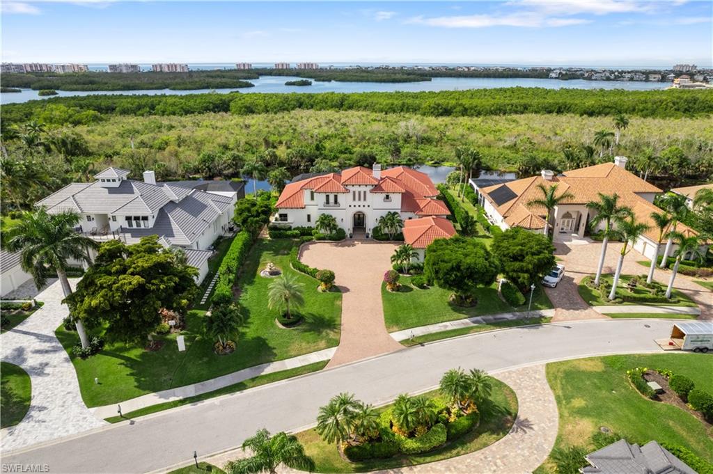 208 Audubon Boulevard Naples, FL 34110 - Photo 44 of 45 an aerial view of a house with garden space and outdoor space