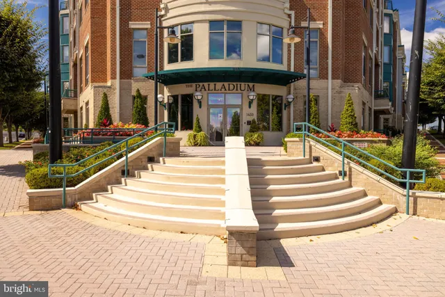 a view of a building with entryway and windows