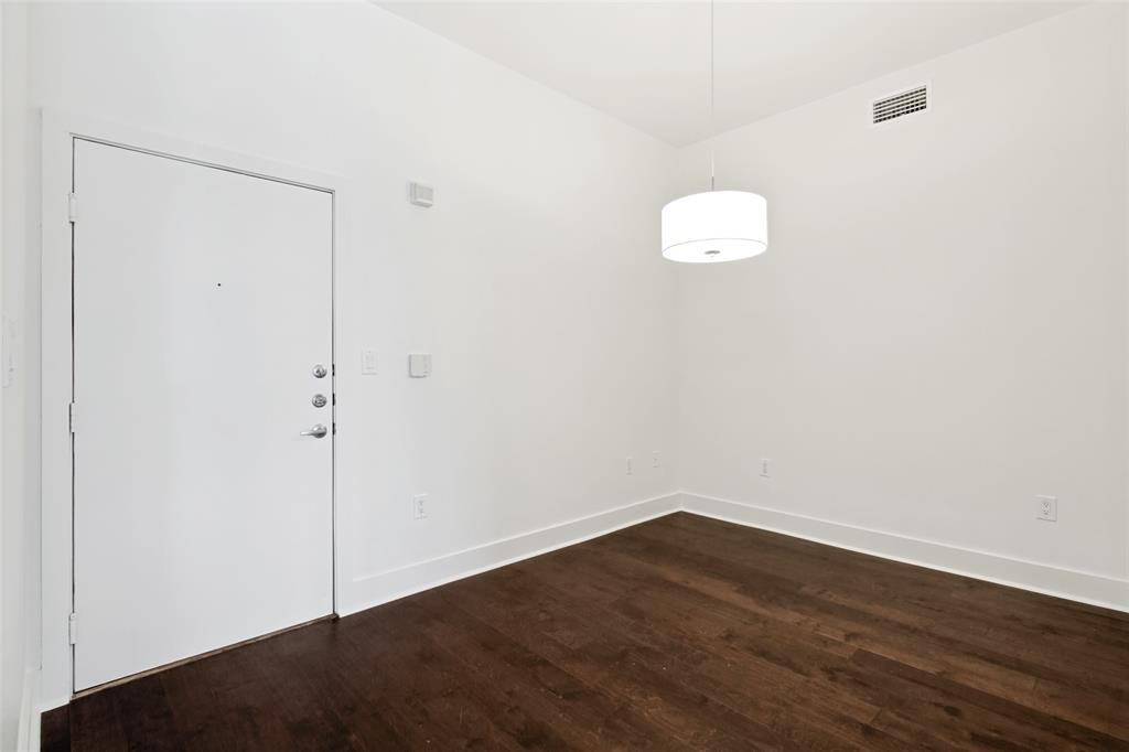4414 Cedar Springs Road, Unit 320 Dallas, TX 75219 - Photo 9 of 17 a view of an empty room