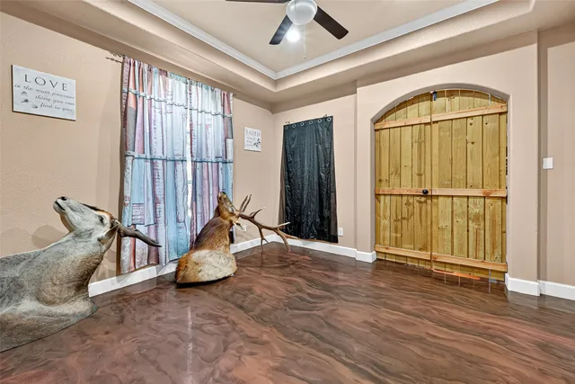 a view of an entryway with wooden floor