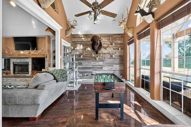 a bedroom with furniture and a chandelier
