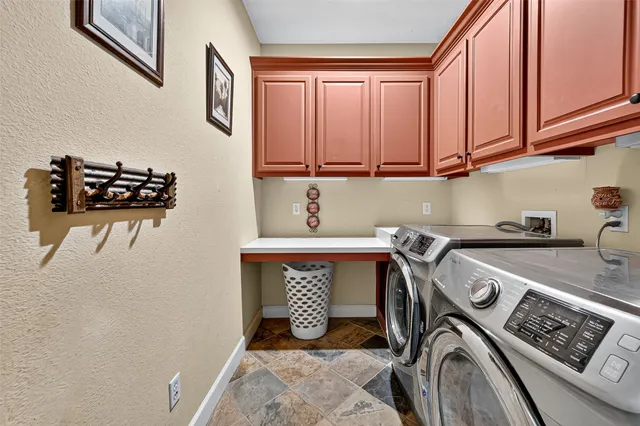 a bedroom with a bed and a wooden floor