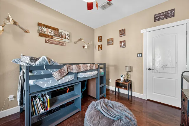 a room with a table and chairs