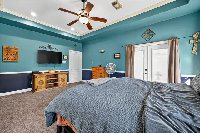 a spacious bathroom with a double vanity sink large mirror and a bathtub