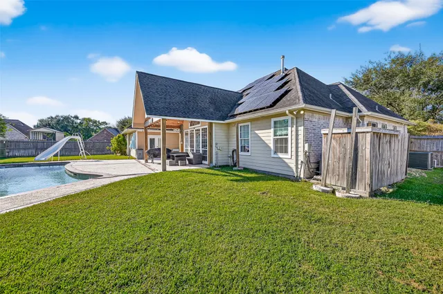 a house view with a garden space