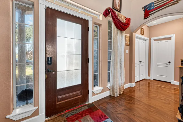 a very nice looking room with wooden floor