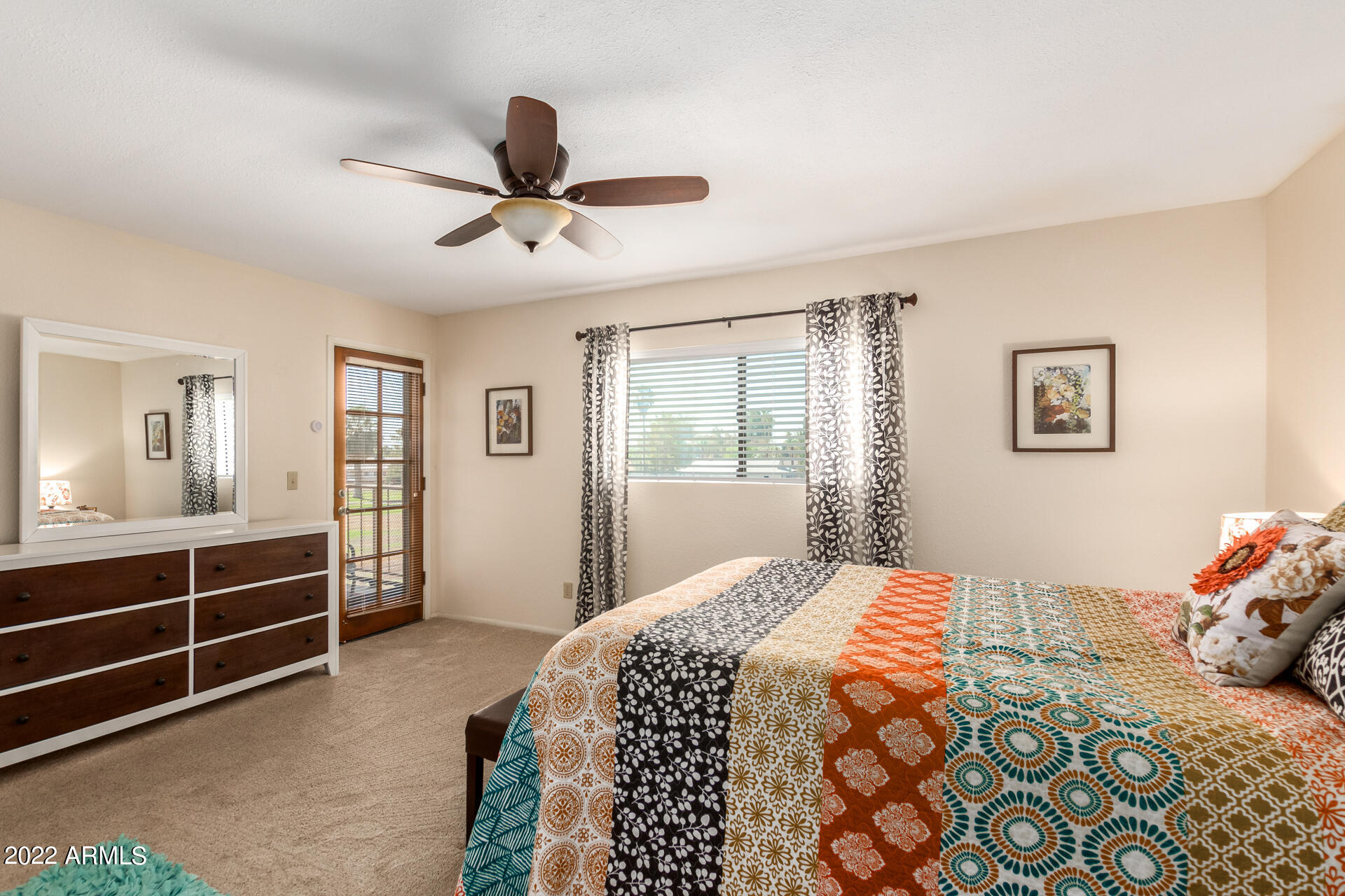 7005 East Broadway Road, Unit 28 Mesa, AZ 85208 - Photo 14 of 27 a bedroom with a bed and a window