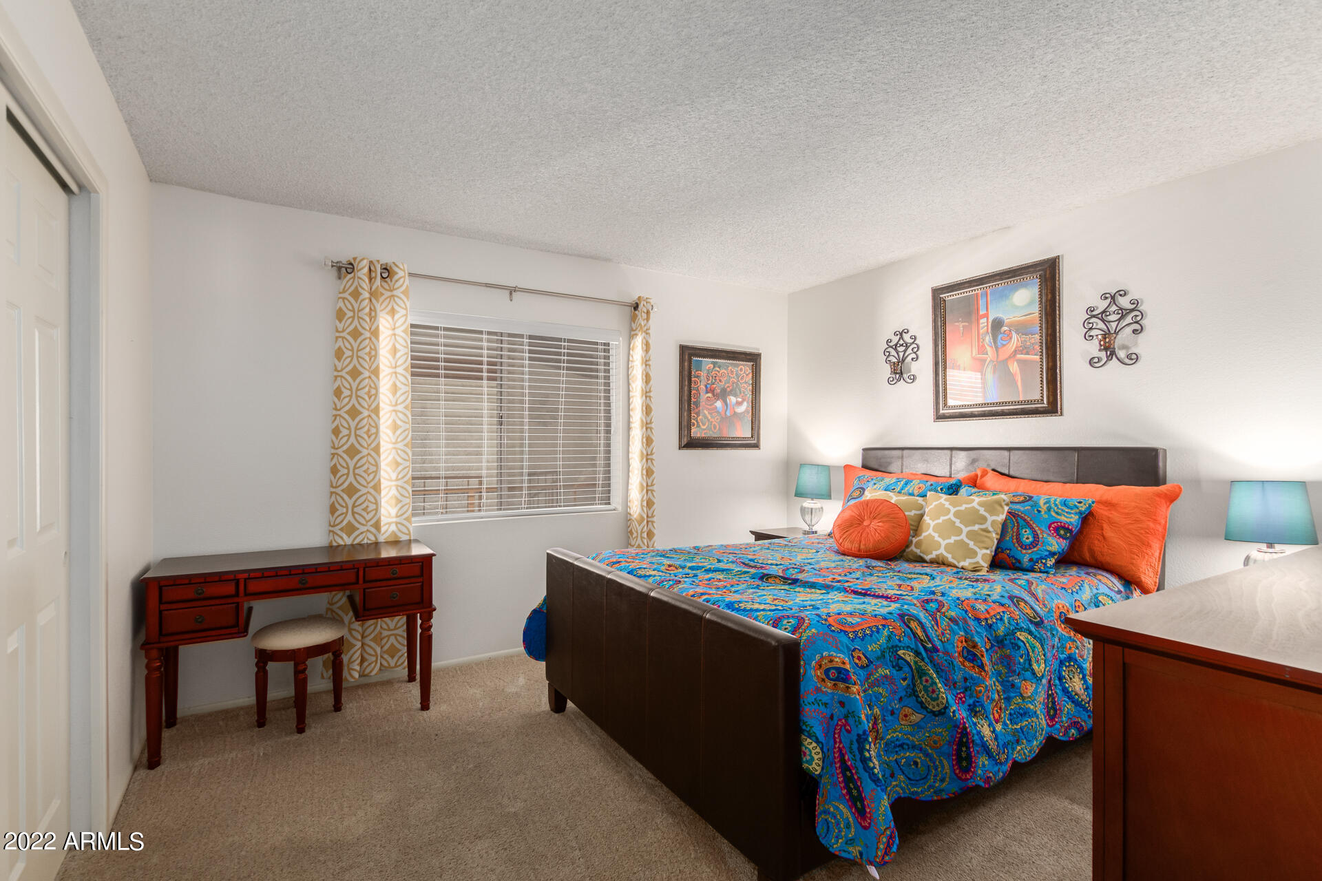 7005 East Broadway Road, Unit 28 Mesa, AZ 85208 - Photo 19 of 27 a bedroom with a bed and a window