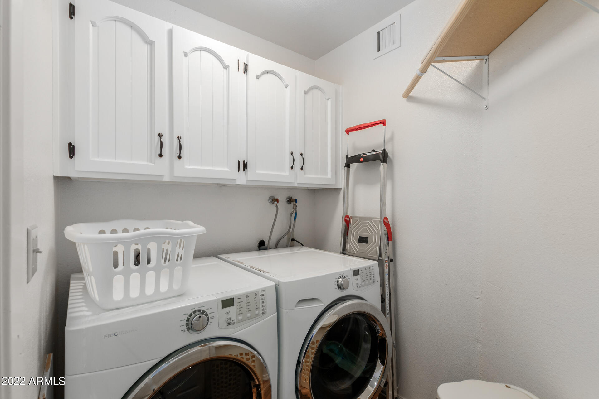 7005 East Broadway Road, Unit 28 Mesa, AZ 85208 - Photo 21 of 27 a utility room with dryer and washer