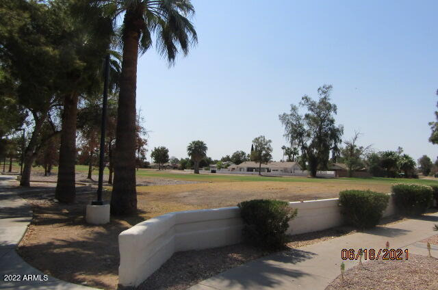 7005 East Broadway Road, Unit 28 Mesa, AZ 85208 - Photo 26 of 27 a view of a lake with outdoor space