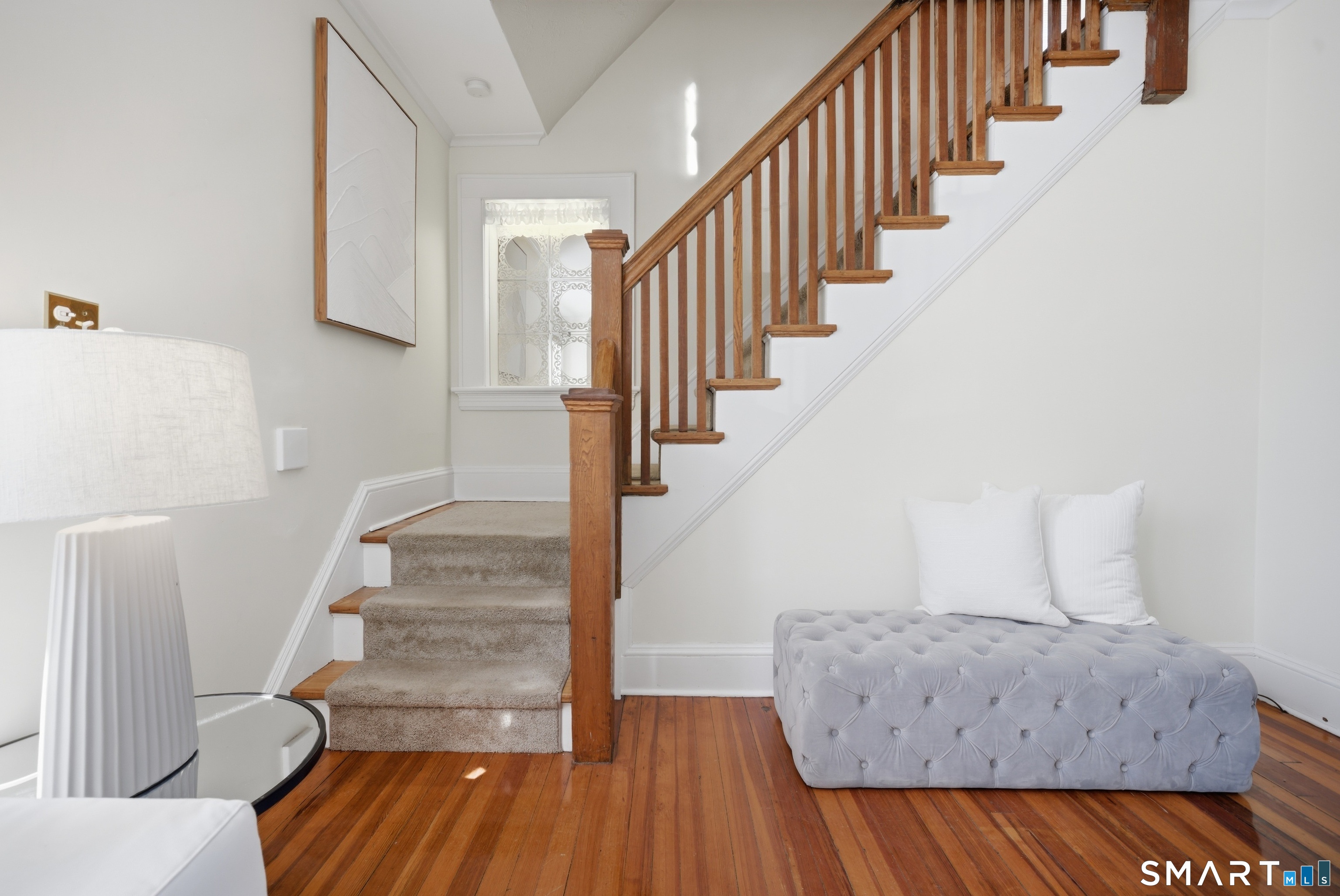 224 Homeland Street Fairfield, CT 06825 - Photo 15 of 37 a view of entryway and hall with wooden floor