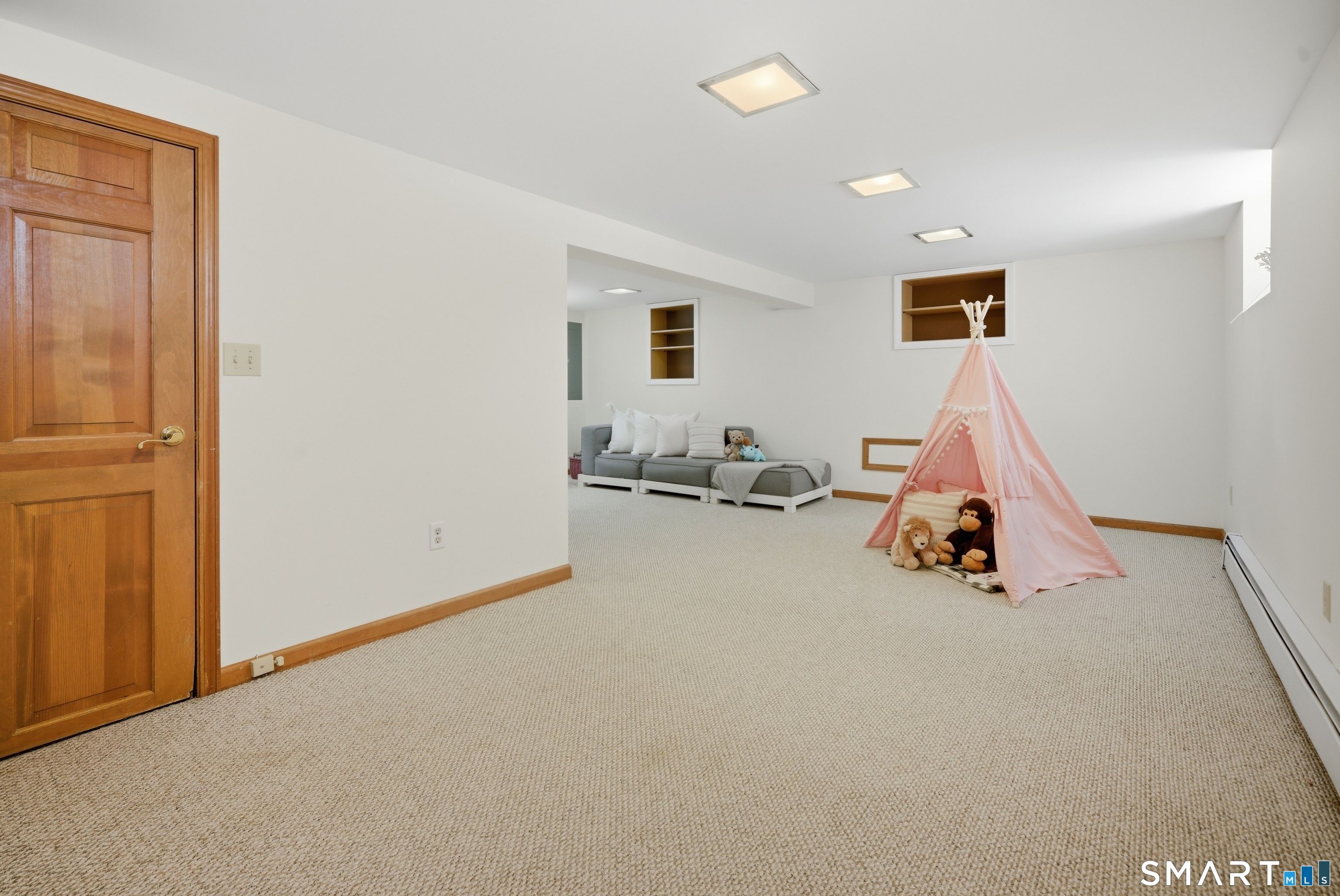 224 Homeland Street Fairfield, CT 06825 - Photo 25 of 37 a view of a room with gym equipment