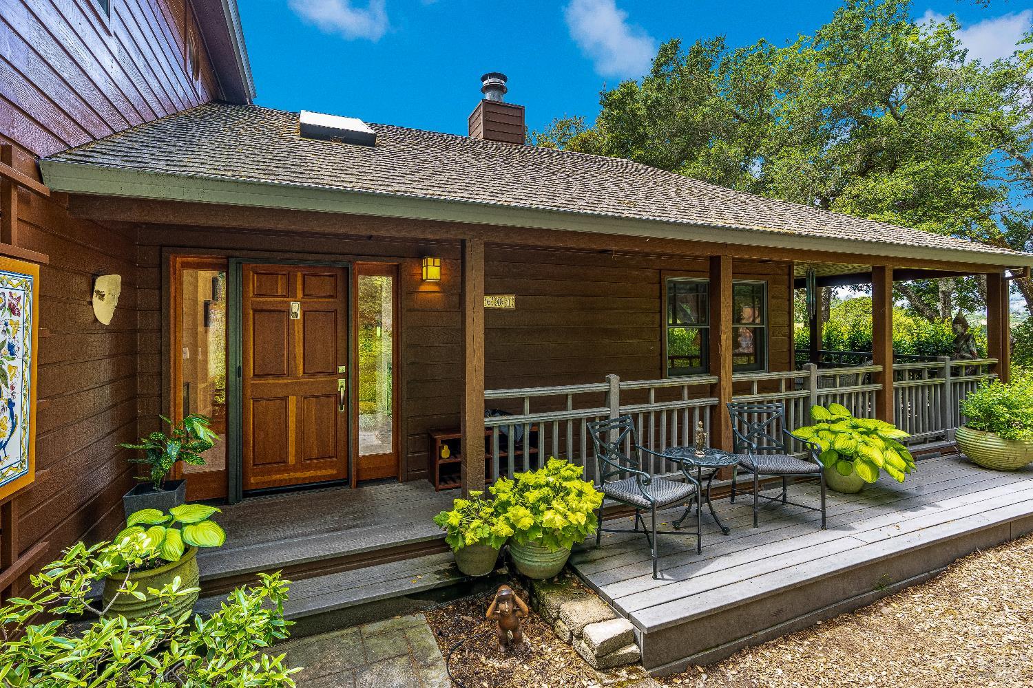 10601 Slattery Road Glen Ellen, CA 95442 - Photo 5 of 45 Entry. Home is wrapped in porches, covered and uncovered.