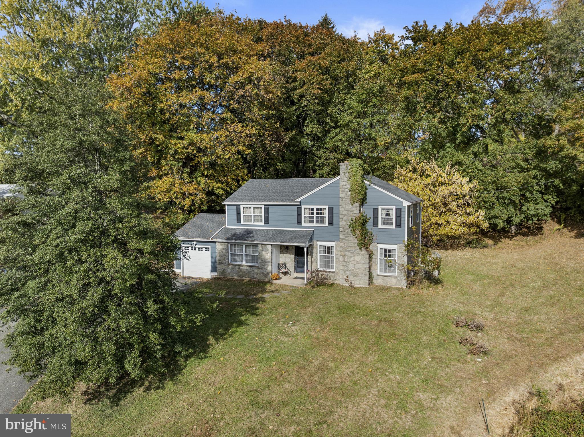 25 Hillendale Road Chadds Ford, PA 19317 - Photo 3 of 40 a small house with a tree in the background