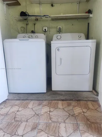a utility room with a washer and dryer